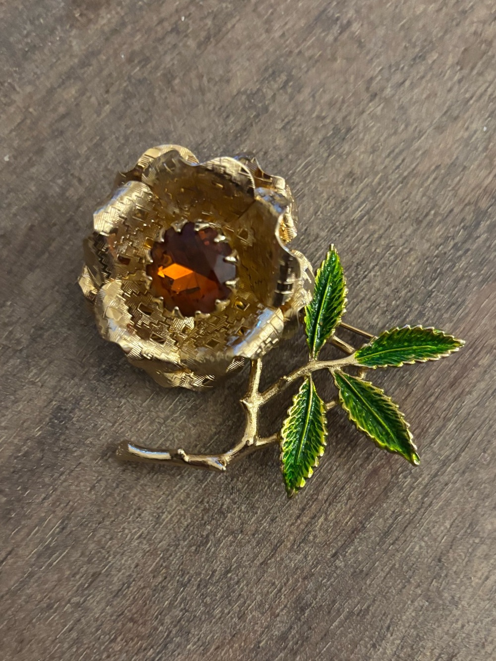 Gold Flower Brooch with Amber Crystal and Green Enamel Leaves